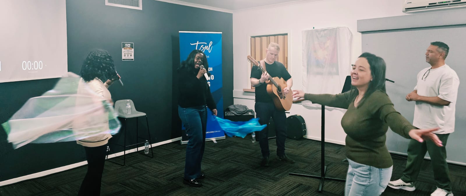 Worship at a Saturday service at TSNL Church Melbourne